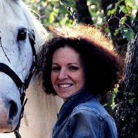 Angélique avec un de ses chevaux